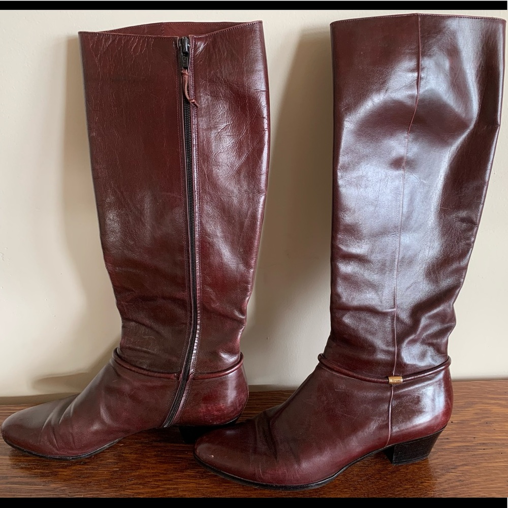 Salvatore Ferragamo burgundy leather riding boots.